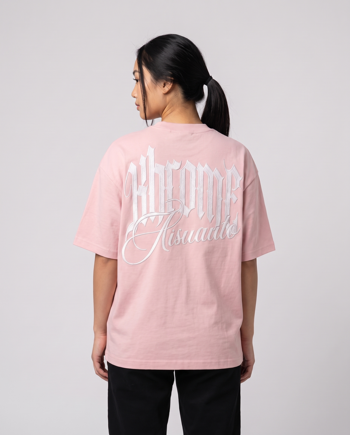 Pink Minimarisuto T-Shirt by KHROME AISUAUTO worn by a model, back view showing the full back print