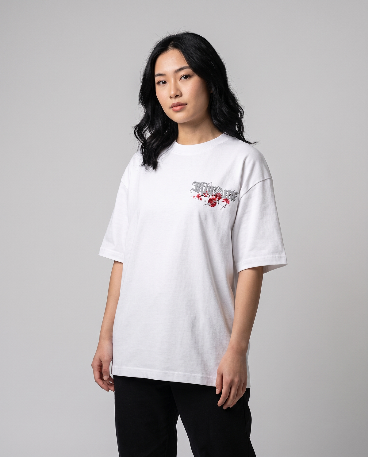 White Kuromu Sakura T-Shirt by KHROME AISUAUTO worn by a model, front view with chest logo
