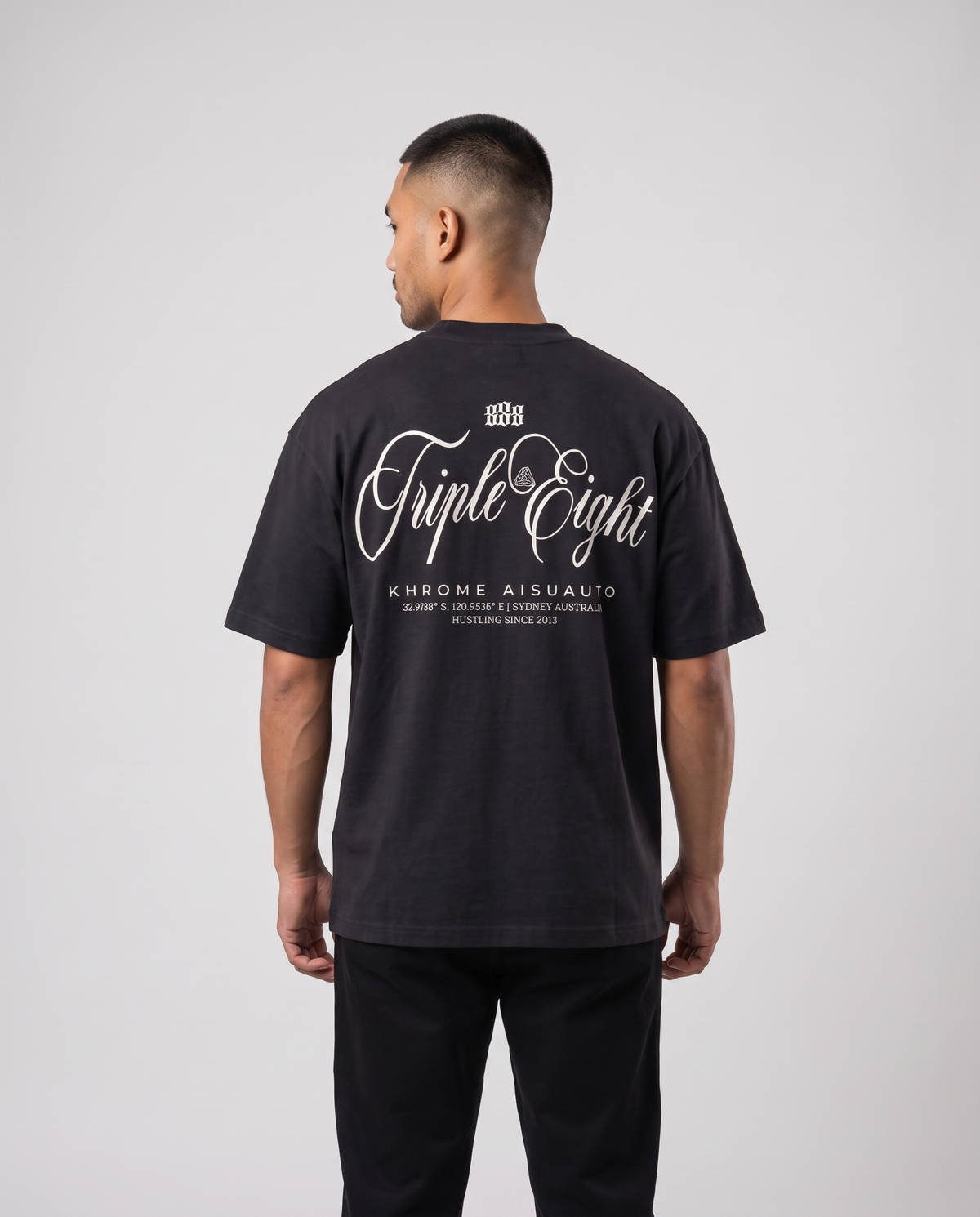 Black Triple Eight T-Shirt by KHROME AISUAUTO worn by a model, back view showing the full back print