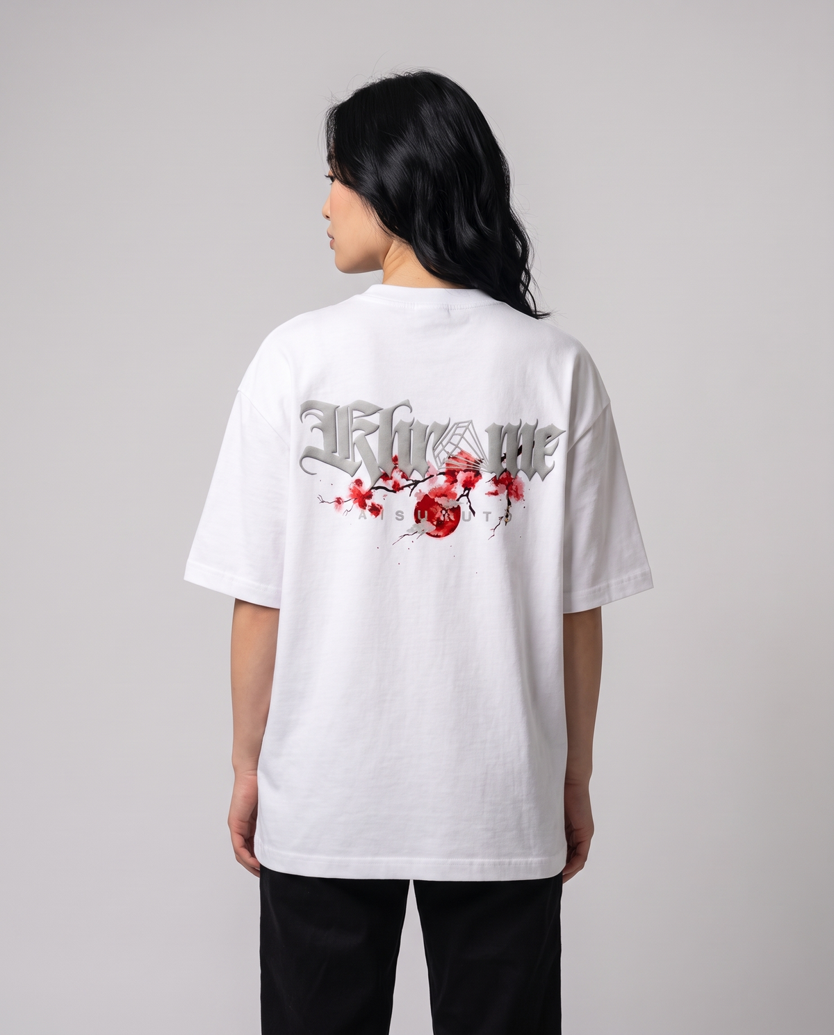 White Kuromu Sakura T-Shirt by KHROME AISUAUTO worn by a model, back view showing the full back print
