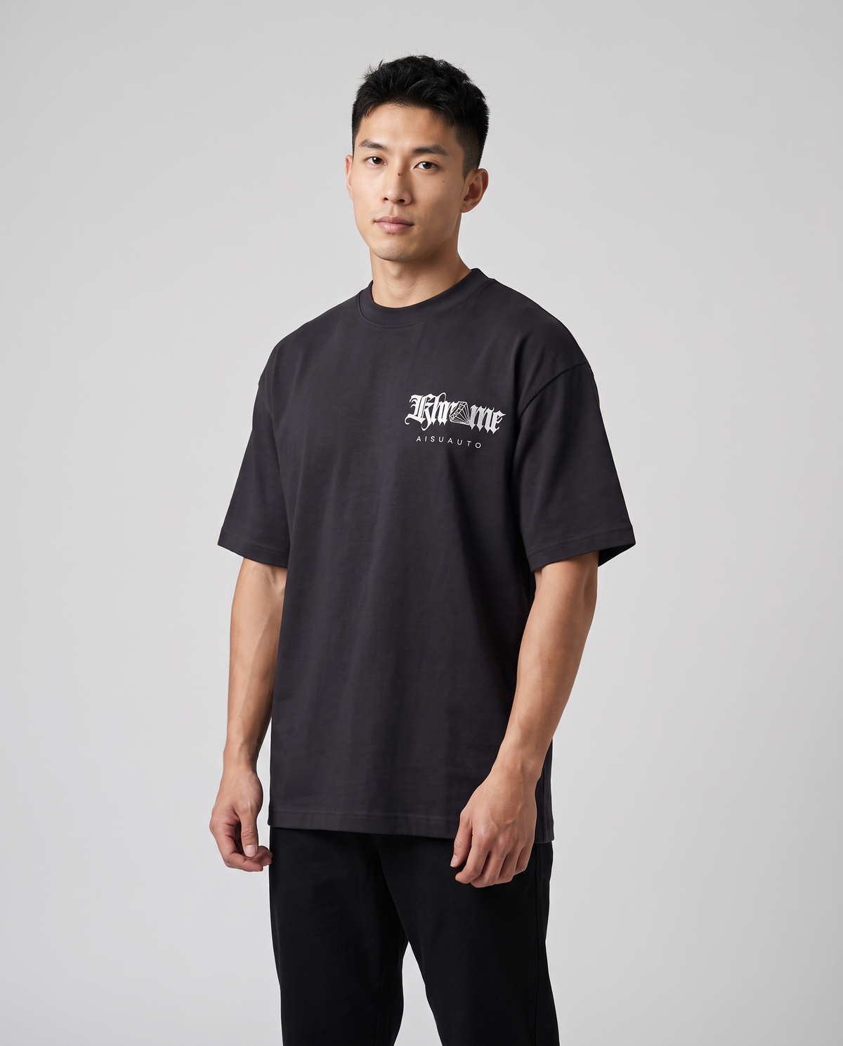 Black Sakurasheniru Blossom T-Shirt by KHROME AISUAUTO worn by a model, front view with chest logo