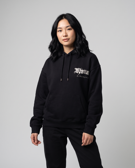 Black Sakurasheniru Hoodie by KHROME AISUAUTO worn by a model, front view with chest logo