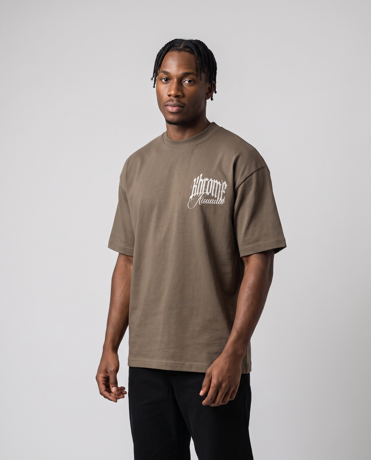Walnut Minimarisuto Sakura T-Shirt by KHROME AISUAUTO worn by a model, front view with chest logo