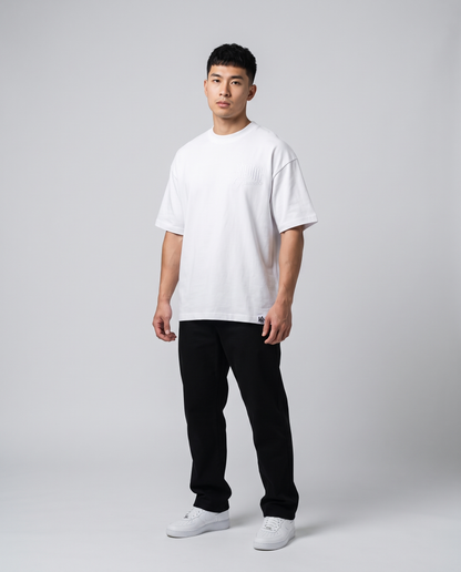 White Minimarisuto T-Shirt by KHROME AISUAUTO worn by a model, front view with chest logo