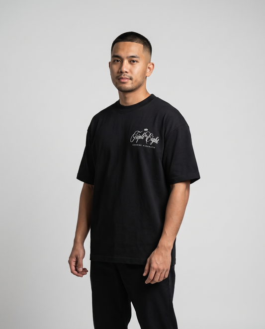 Black Dakusukai Spider T-Shirt by KHROME AISUAUTO worn by a model, front view with chest logo