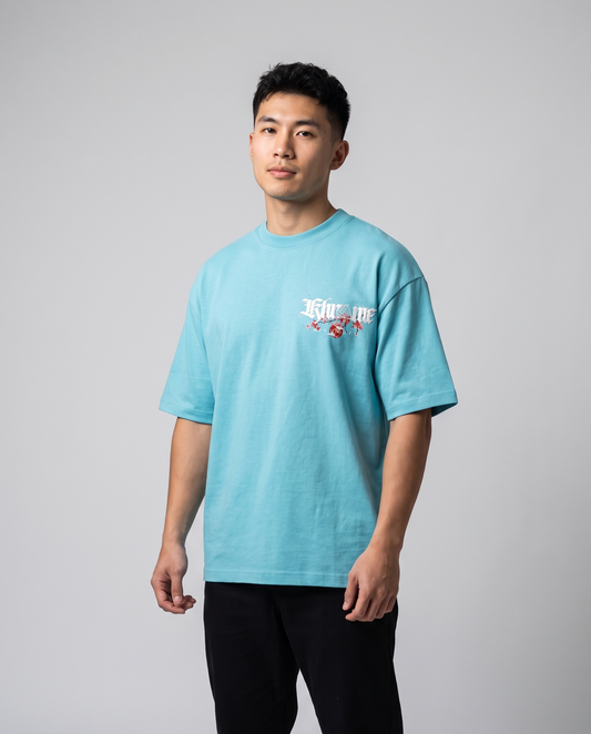 Tiffany Blue Kuromu Sakura T-Shirt by KHROME AISUAUTO worn by a model, front view with chest logo