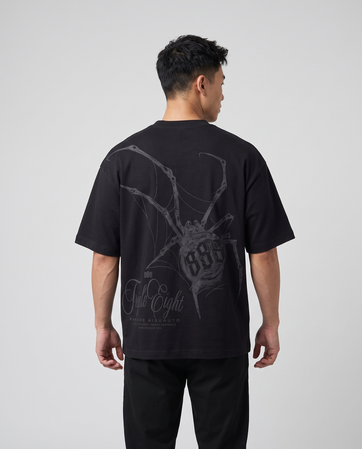 Black Dakusukai Spider T-Shirt Black On Black by KHROME AISUAUTO worn by a model, back view showing the full back print