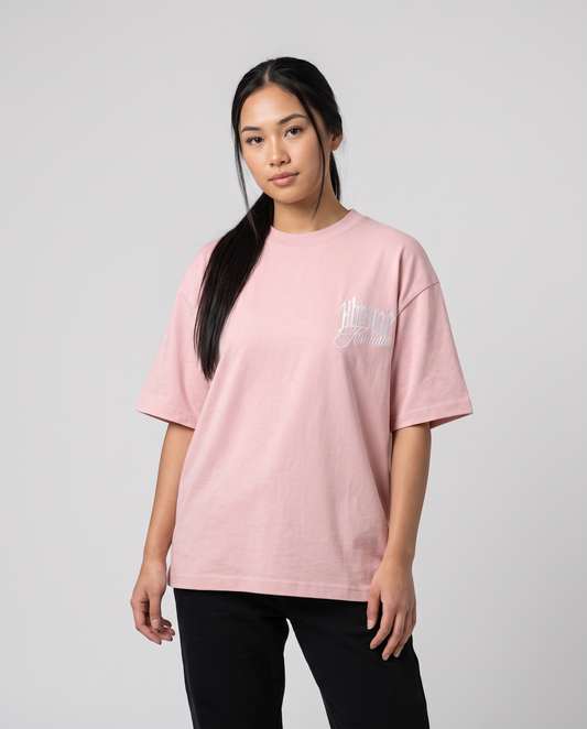 Pink Minimarisuto T-Shirt by KHROME AISUAUTO worn by a model, front view with chest logo