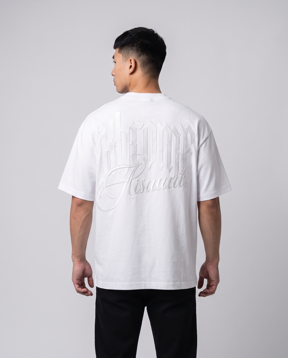 White Minimarisuto T-Shirt by KHROME AISUAUTO worn by a model, back view showing the full back print