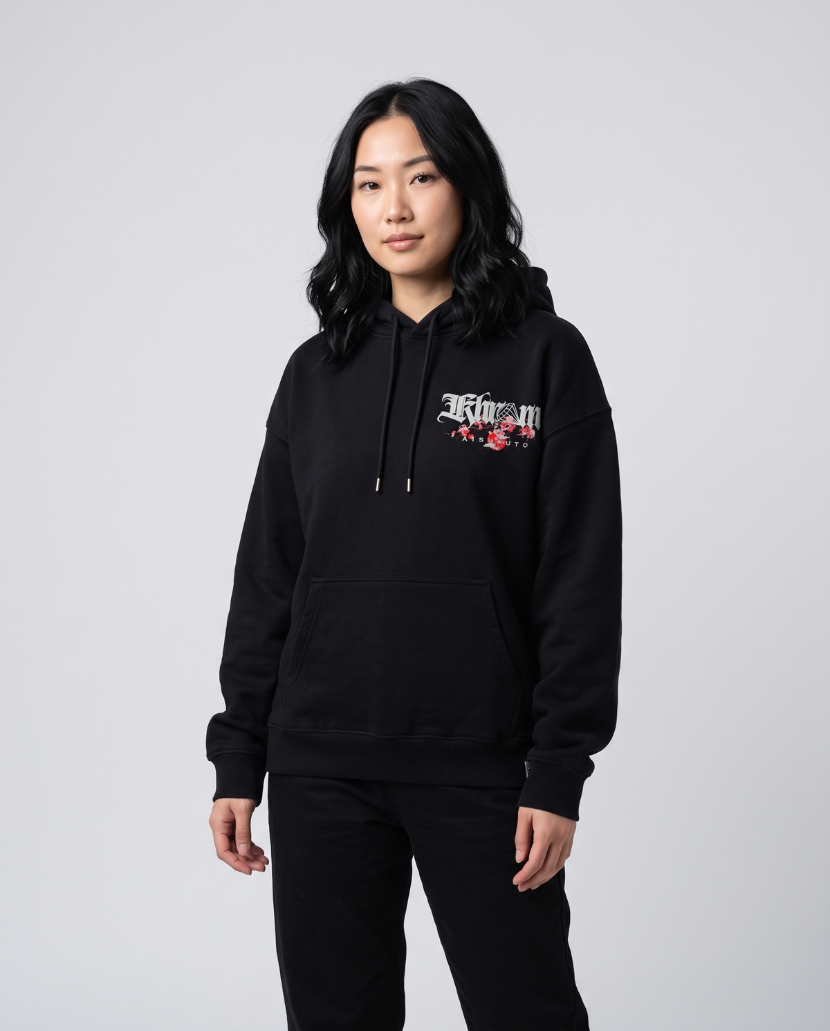 Black Kuromu Sakura Hoodie by KHROME AISUAUTO worn by a model, front view with chest logo