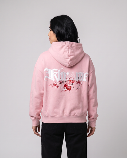 Baby Pink Kuromu Sakura Hoodie by KHROME AISUAUTO worn by a model, back view showing the full back print