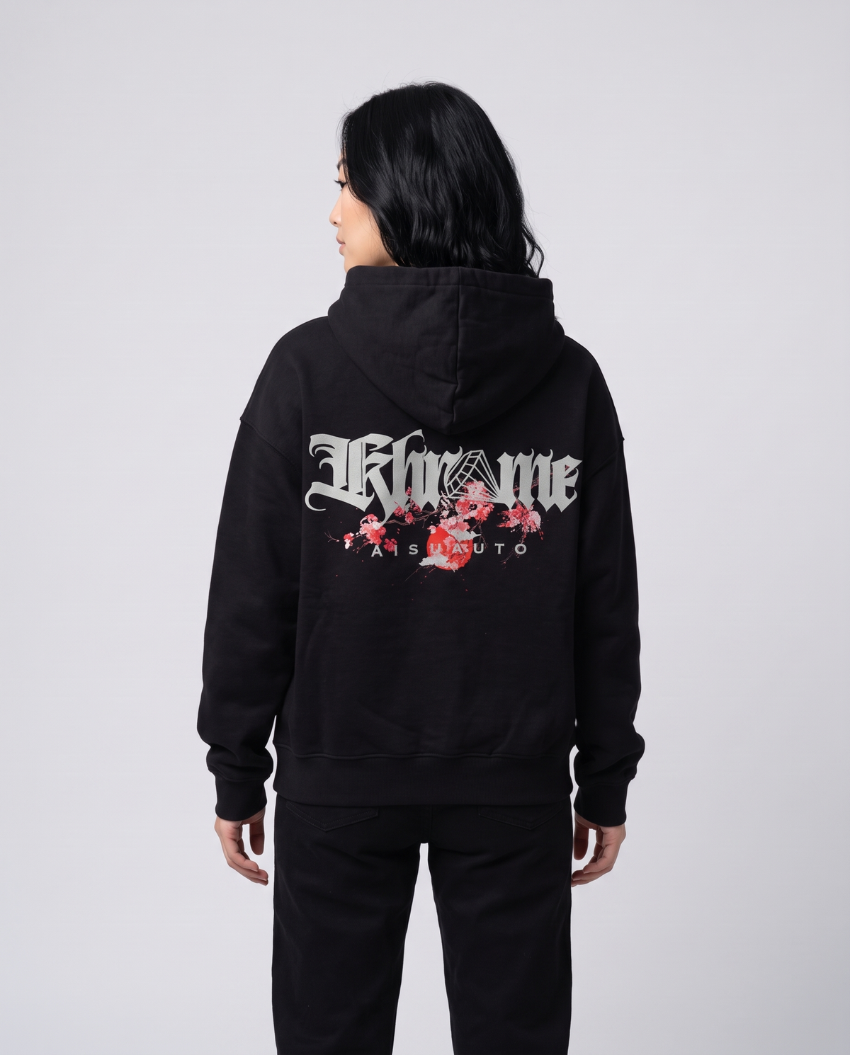 Black Kuromu Sakura Hoodie by KHROME AISUAUTO worn by a model, back view showing the full back print