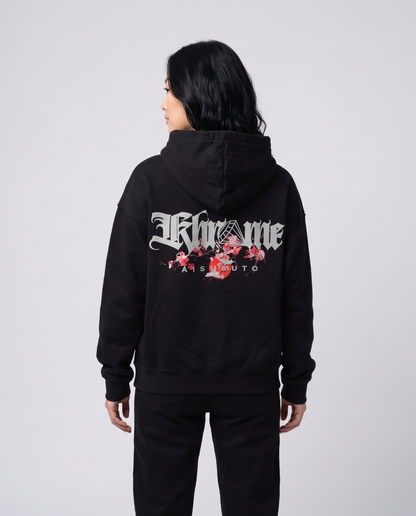 Black Kuromu Sakura Hoodie by KHROME AISUAUTO worn by a model, back view showing the full back print