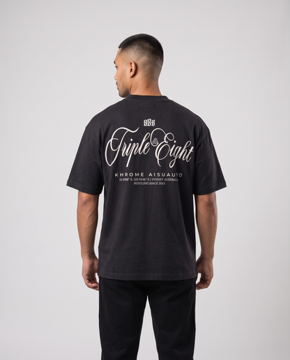 Black Triple Eight T-Shirt by KHROME AISUAUTO worn by a model, back view showing the full back print