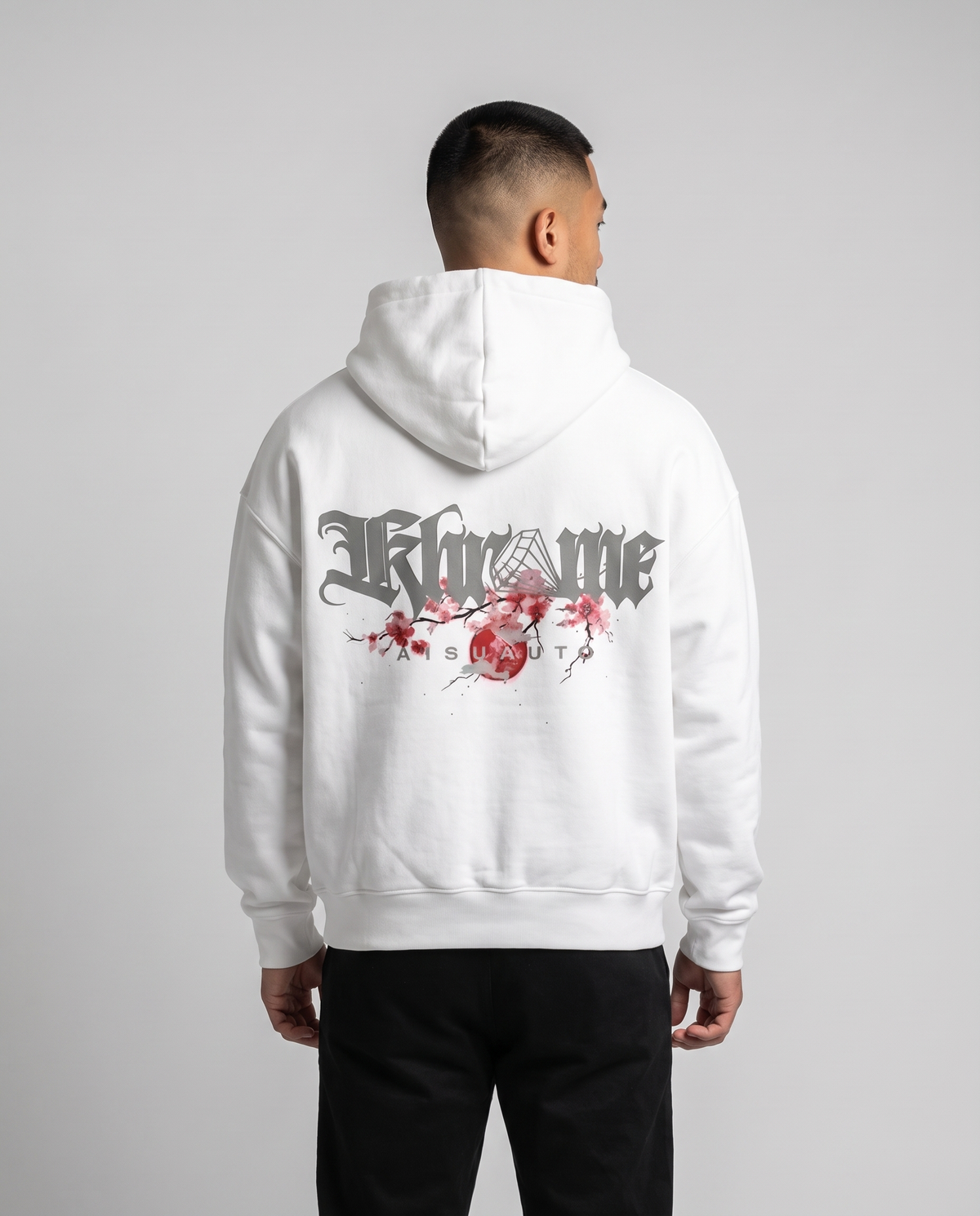 White Kuromu Sakura Hoodie by KHROME AISUAUTO worn by a model, back view showing the full back print