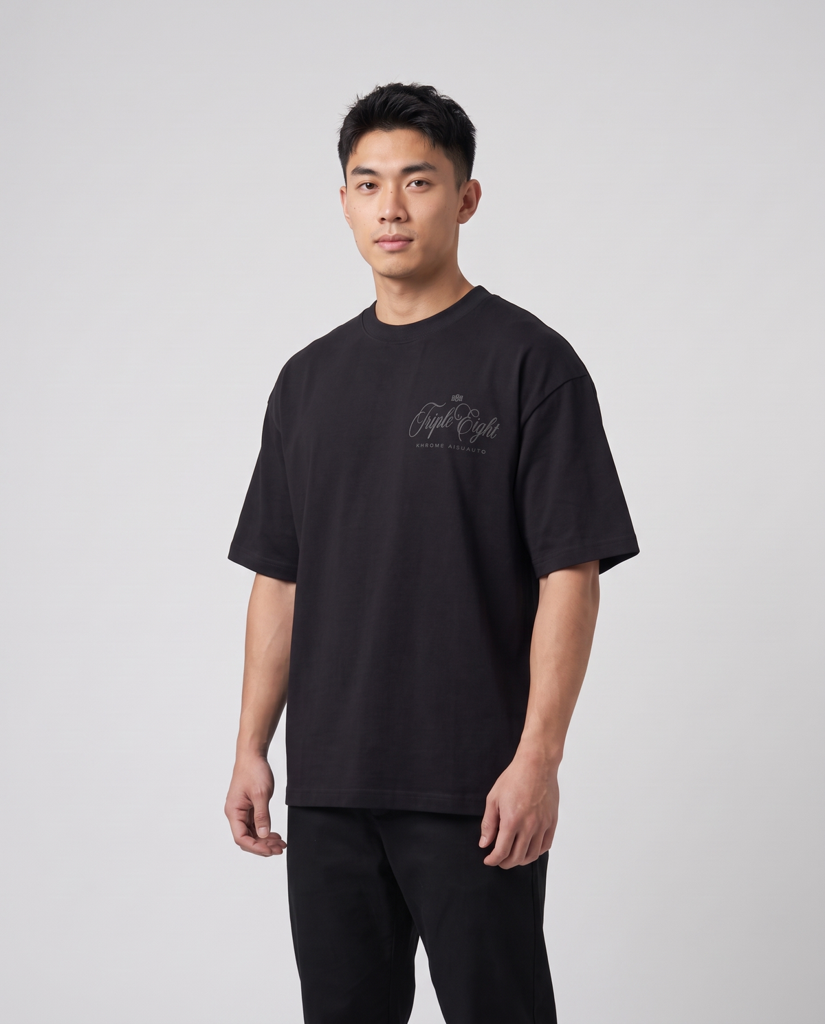 Black Dakusukai Spider T-Shirt Black On Black by KHROME AISUAUTO worn by a model, front view with chest logo