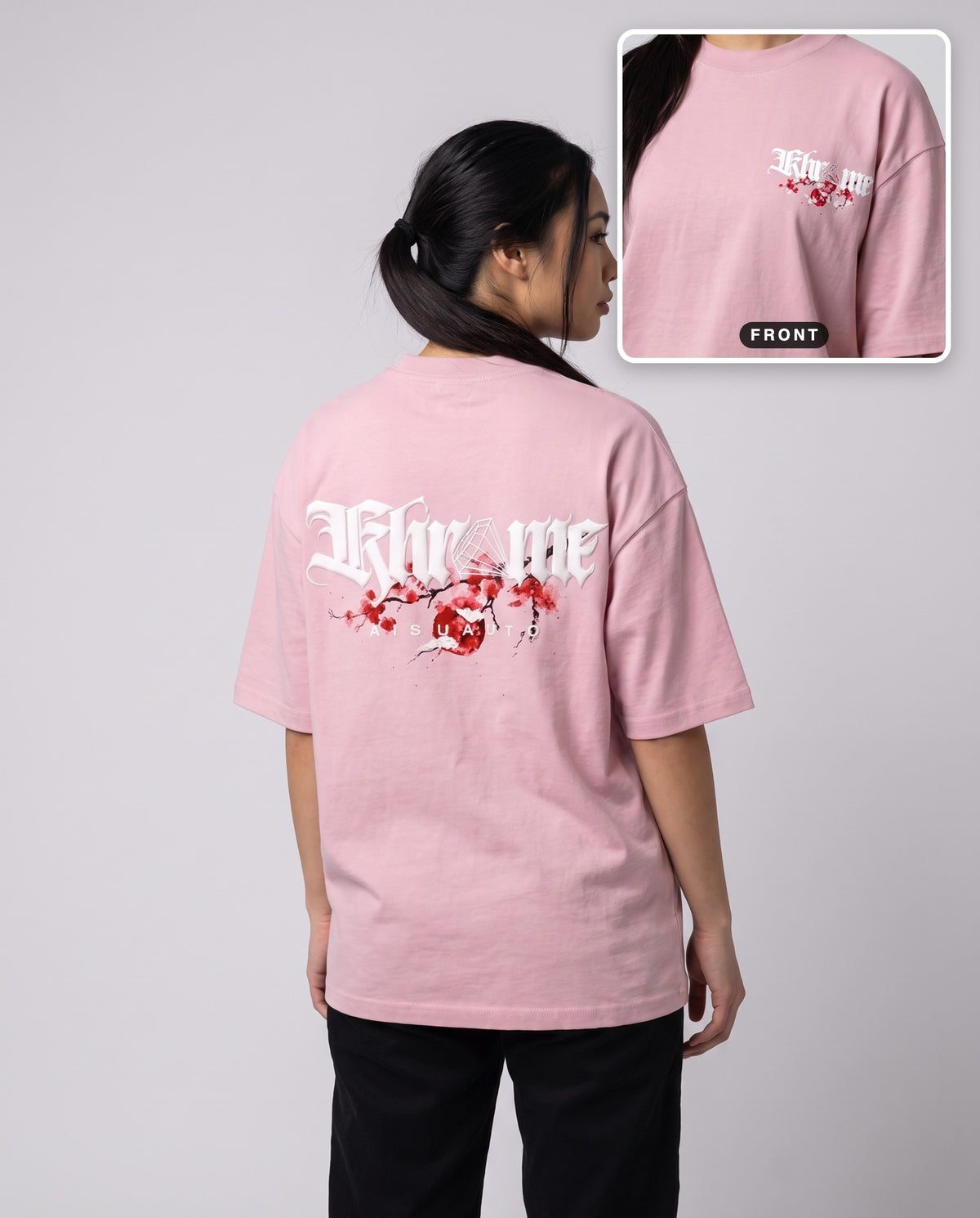 Baby Pink Kuromu Sakura T-Shirt by KHROME AISUAUTO worn by a model, back print with front chest logo detail