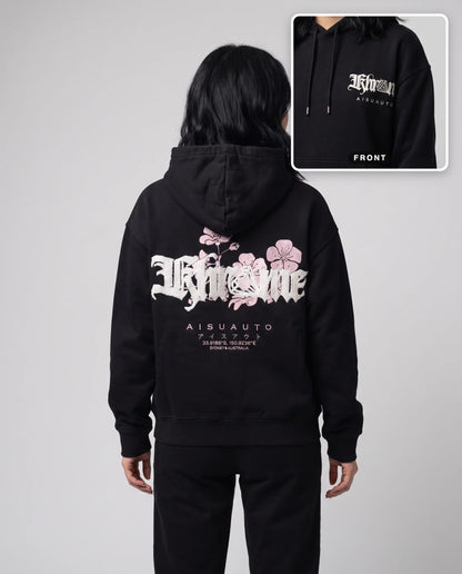 Black Sakurasheniru Hoodie by KHROME AISUAUTO worn by a model, back print with front chest logo detail