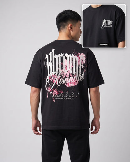 Black Minimarisuto Sakura T-Shirt by KHROME AISUAUTO worn by a model, back print with front chest logo detail