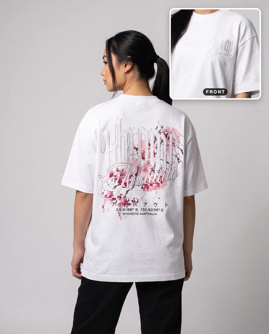 White Minimarisuto Sakura T-Shirt by KHROME AISUAUTO worn by a model, back print with front chest logo detail