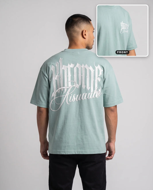 Teal Minimarisuto T-Shirt by KHROME AISUAUTO worn by a model, back print with front chest logo detail
