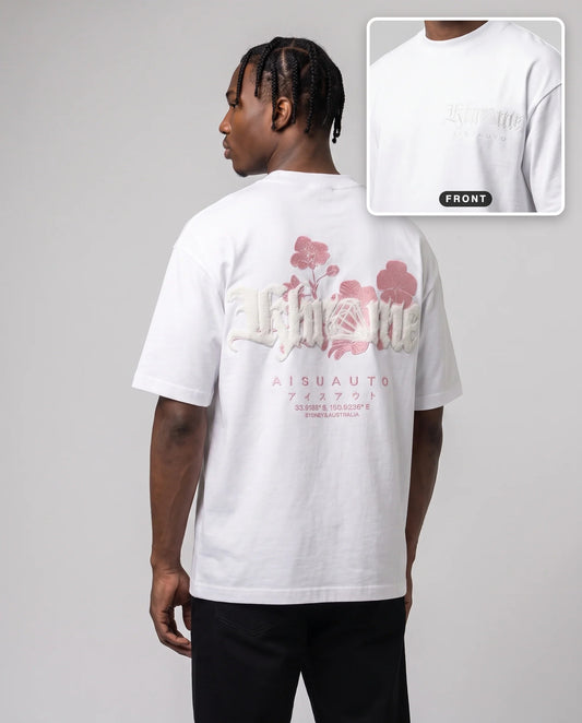 White Sakurasheniru Blossom T-Shirt by KHROME AISUAUTO worn by a model, back print with front chest logo detail