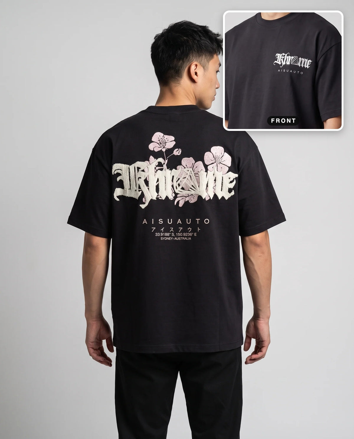 Black Sakurasheniru Blossom T-Shirt by KHROME AISUAUTO worn by a model, back print with front chest logo detail
