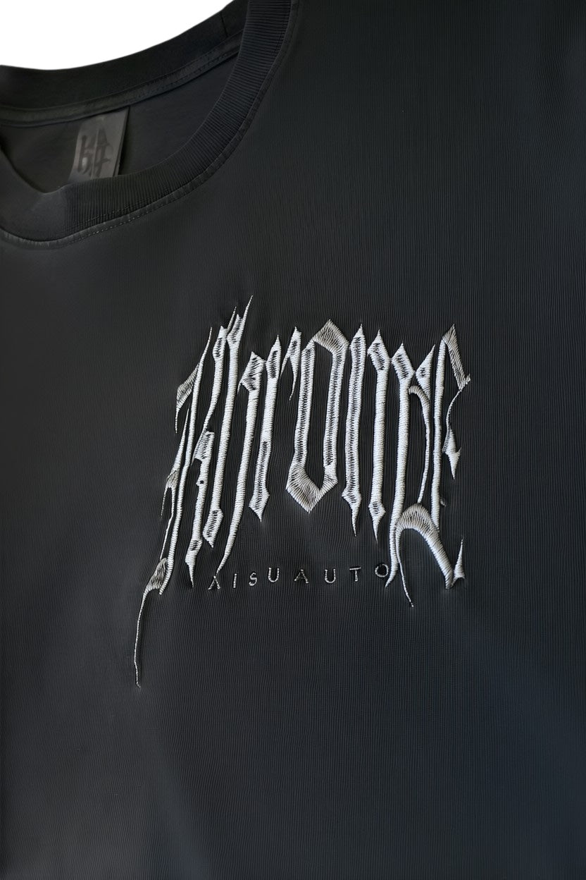 KHROME faded black oversized 100% cotton t-shirt with gothic logo embroidery and relaxed fit.